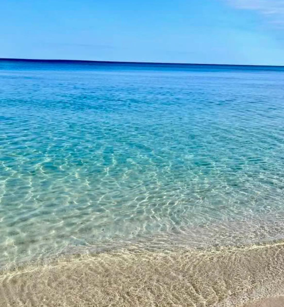 Sandy shore and clear waters, Ionian coast